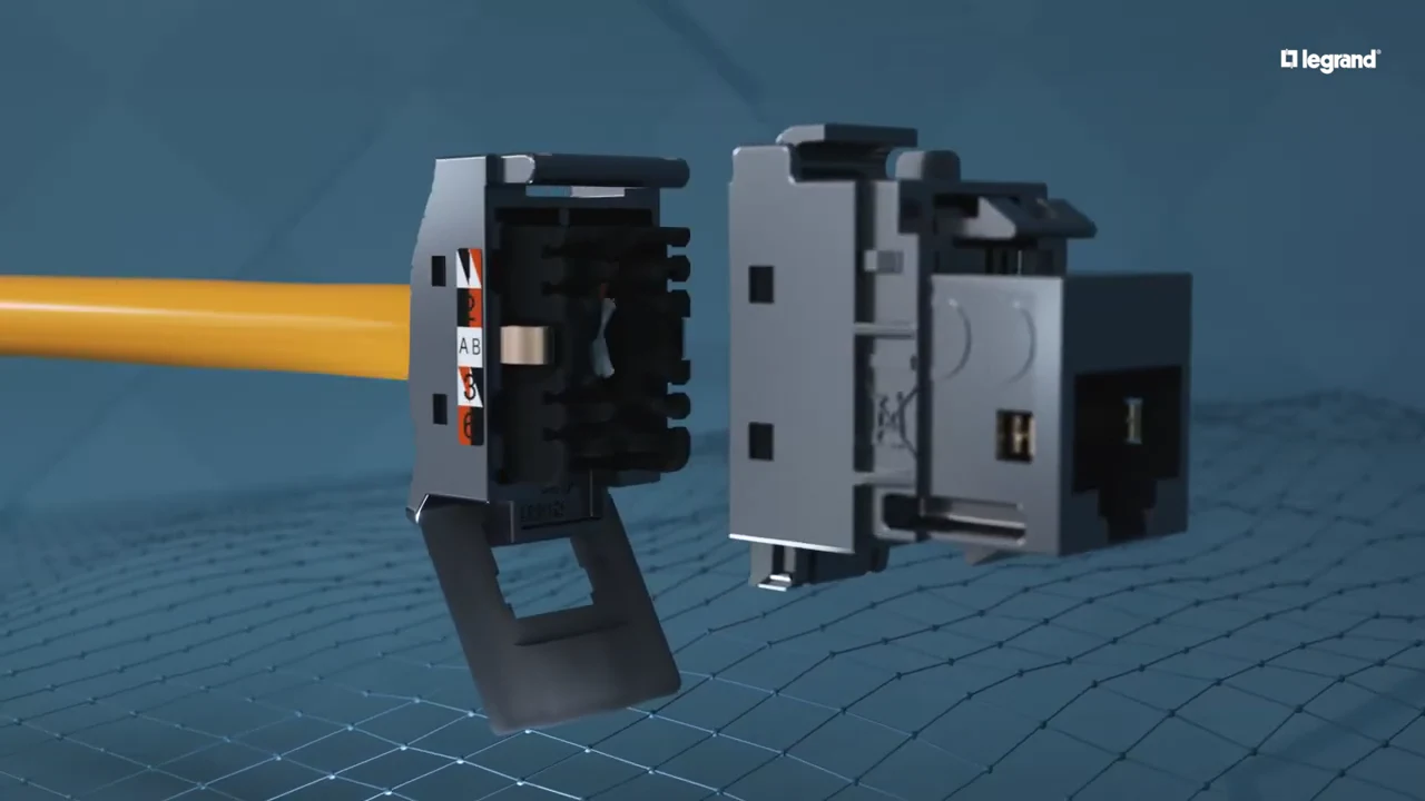 Frame at 0:18: 3D animation of the LINKEO C connector parts closing around a yellow network cable