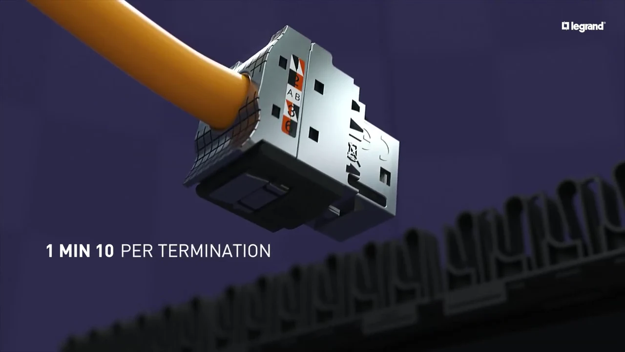 Frame at 0:39: the on-screen claim "1 min 10 per termination" beside a terminated LINKEO C connector on a yellow cable